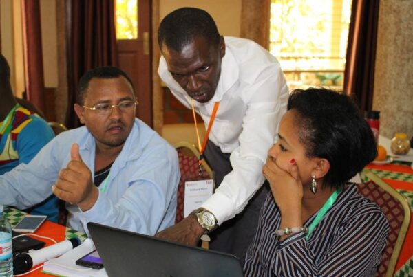 trainer with participants at a GREAT course