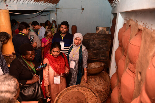 Participants take photos of agricultural products